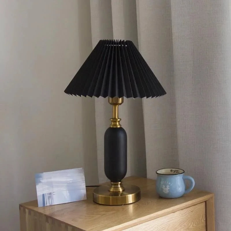 Black winter melon-shaped brass base.webp__PID:fdc73a9c-6cb3-4ac6-b9a9-5d1c78327c62
